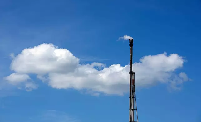 The Feyzin Total oil refinery is seen outside Lyon, France, Friday, April 17, 2026. (AP Photo/Laurent Cipriani)
