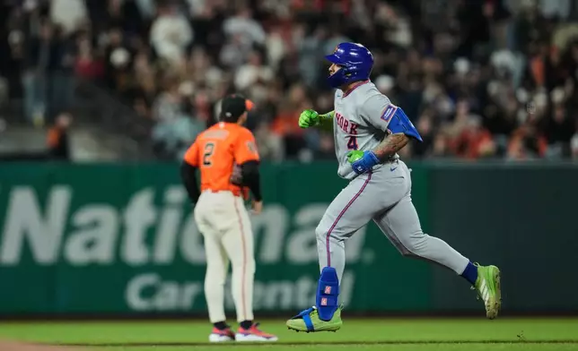 New York Mets' Francisco Alvarez (4) runs the bases after hitting a solo home run during the fourth inning of a baseball game against the San Francisco Giants, Friday, April 3, 2026, in San Francisco. (AP Photo/Godofredo A. Vásquez)