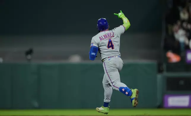 New York Mets' Francisco Alvarez (4) runs the bases after hitting a solo home run during the seventh inning of a baseball game against the San Francisco Giants, Friday, April 3, 2026, in San Francisco. (AP Photo/Godofredo A. Vásquez)