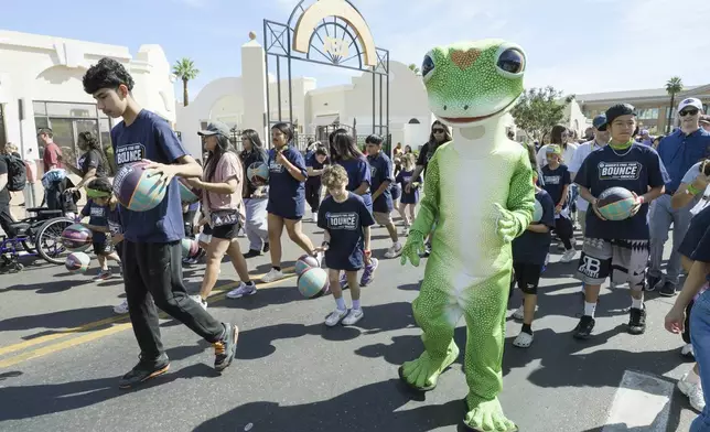 The GEICO Gecko joined the local community at the Bounce event in Phoenix to celebrate GEICO’s donation of sports equipment to a local Boys &amp; Girls Clubs on Saturday, April 4, 2026 in Phoenix. Through this effort, GEICO and donation partner Good Sports are helping provide local youth with access to sports equipment and opportunities to build confidence, develop skills, and thrive both on and off the court. (Mark Peterman/AP Content Services for GEICO)