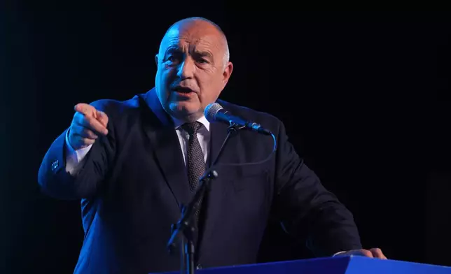 Former three-time conservative Prime Minister Boyko Borissov delivers a speech at the closing rally of his campaign, in Samokov, Bulgaria, Wednesday, April 15, 2026. (AP Photo/Valentina Petrova)
