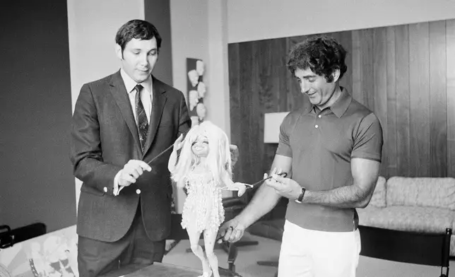 FILE - Sid Krofft, right, and his brother Marty Krofft appear with the puppet "Collette," developed for "The Dean Martin Show," appear in Los Angeles on Aug. 27, 1968. (AP Photo/Harold Filan, File)