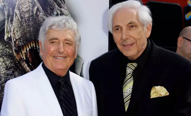 FILE - Producers Sid Krofft, left, and Marty Krofft arrive at the premiere of "Land of the Lost" in Los Angeles on May 30, 2009. (AP Photo/Reed Saxon, File)