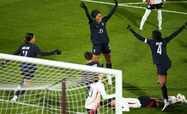 United States defender Kennedy Wesley (25) celebrates a goal against Japan during the second half of an international friendly soccer match Friday, April 17, 2026, in Commerce City, Colo. (AP Photo/Jack Dempsey)