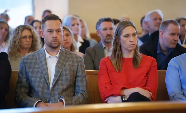 Ashley Okland's siblings, Josh Okland and Brittany Bruce, attend a hearing for Kristin Ramsey at the Dallas County courthouse in Adel, Iowa, on Friday, April 10, 2026. (Zach Boyden-Holmes/The Des Moines Register via AP, Pool)
