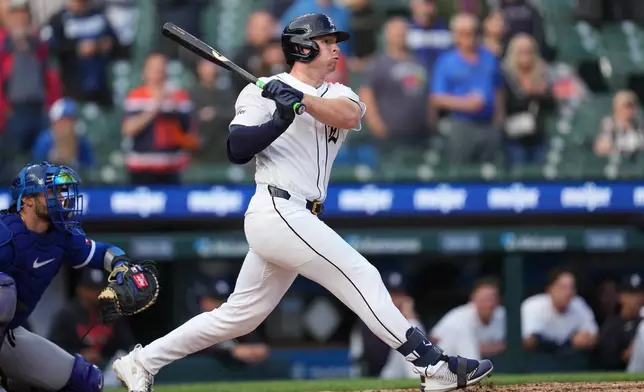 Detroit Tigers' Colt Keith hits a one-run single against the Kansas City Royals during the ninth inning of a baseball game Thursday, April 16, 2026, in Detroit. (AP Photo/Paul Sancya)