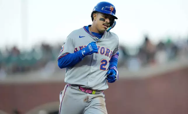 New York Mets' Mark Vientos rounds the bases after hitting a solo home run during the second inning of a baseball game against the San Francisco Giants in San Francisco, Thursday, April 2, 2026. (AP Photo/Tony Avelar)