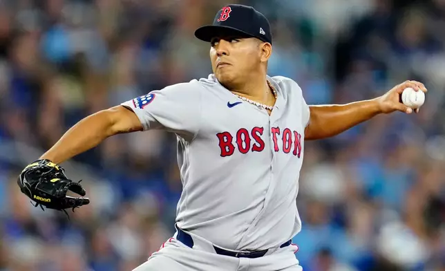 Boston Red Sox pitcher Ranger Suarez works against the Toronto Blue Jays during first-inning baseball game action in Toronto, Monday, April 27, 2026. (Frank Gunn/The Canadian Press via AP)