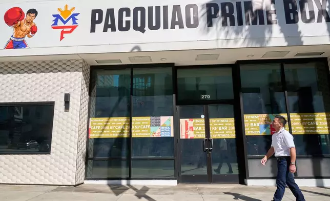 Boxer Manny Pacquiao tours "Pacquiao Prime Boxing," his newly acquired gym in Hollywood, on Monday, April 6, 2026. The facility was formerly owned by rival Floyd Mayweather Jr. (AP Photo/Damian Dovarganes)