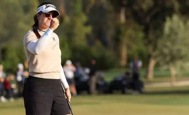 Hannah Green celebrates after winning the LPGA JM Eagle LA Championship golf tournament golf tournament at El Caballero Country Club, Sunday, April 19, 2026, in Los Angeles. (AP Photo/Jessie Alcheh)