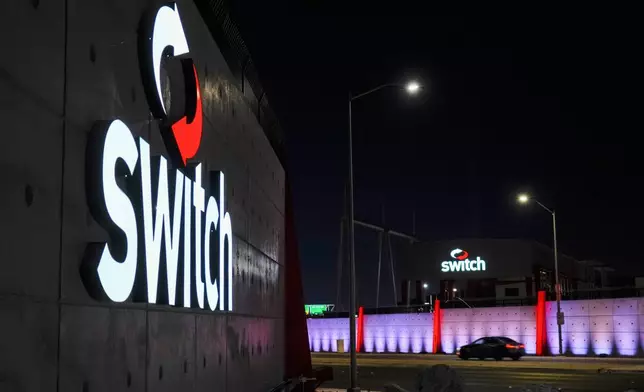 Lights illuminate a Switch data center, Wednesday, April 1, 2026, in Las Vegas. (AP Photo/Ty ONeil)