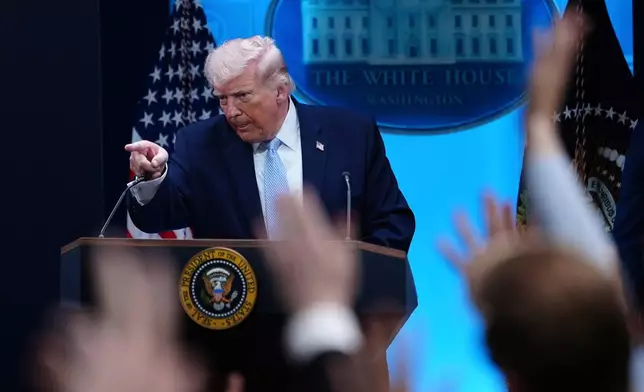 President Donald Trump gestures while speaking with reporters in the James Brady Press Briefing Room at the White House, Monday, April 6, 2026, in Washington. (AP Photo/Julia Demaree Nikhinson)