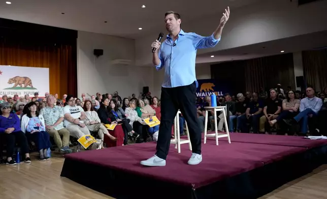California gubernatorial candidate Rep. Eric Swalwell, D-Calif., speaks at a town hall meeting in Sacramento, Calif., Tuesday, April 7, 2026. (AP Photo/Rich Pedroncelli)