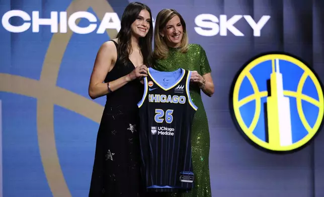 UCLA guard Gabriela Jaquez poses with WNBA commissioner Cathy Engelbert after being selected fifth overall by the Chicago Sky in the first round of the WNBA basketball draft Monday, April 13, 2026, in New York. (AP Photo/Pamela Smith)