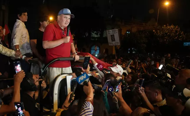 Rafael Lopez Aliaga, presidential candidate of the Popular Renewal party, speaks to supporters as electoral authorities continue to count the ballots two days after general elections in Lima, Peru, Tuesday, April 14, 2026. (AP Photo/Guadalupe Pardo)