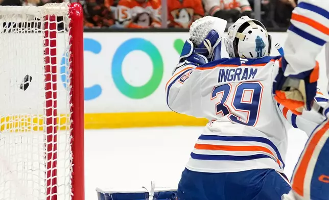 Edmonton Oilers goaltender Connor Ingram is scored on by Anaheim Ducks center Mason McTavish during the first period of Game 3 in the first round of the NHL hockey Stanley Cup playoffs Friday, April 24, 2026, in Anaheim, Calif. (AP Photo/Mark J. Terrill)