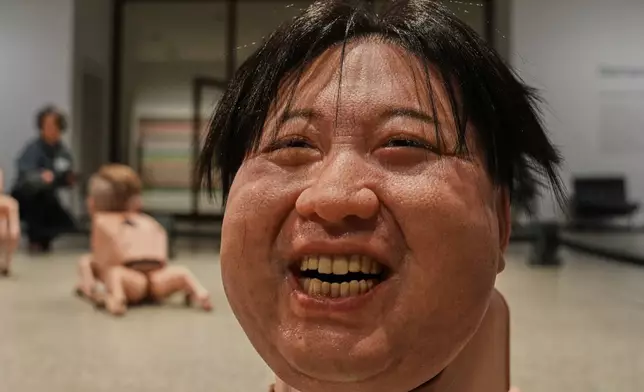 A Robot in the likeness of Kim Jong Un displayed at the installation titled Regular Animals by artist Beeple, Mike Winkelmann, at the Neue Nationalgalerie museum in Berlin, Germany, Tuesday, April 28, 2026. (AP Photo/Markus Schreiber)