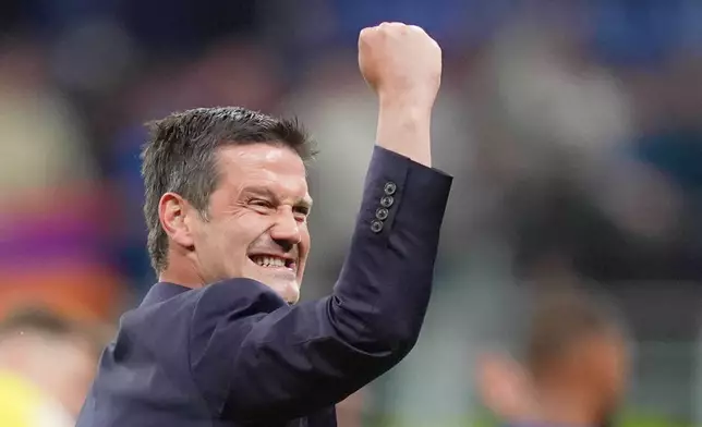 Inter Milan's head coach Cristian Chivu reacts after the Italian Cup, second-leg soccer match between Inter Milan and Como, in Milan, Italy, Tuesday, April 21, 2026. (Spada/LaPresse via AP)