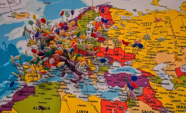 Pins placed by visitors on a map at a Twistee Treat Diner in Livingston, Ill, Thursday, Nov. 20, 2025. (AP Photo/Jeff Roberson)