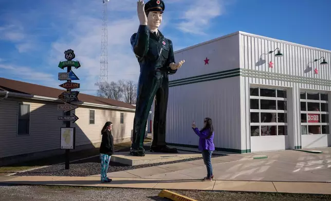 Donna Webb and her daughter Victorija explore the American Giants Museum along historic Route 66, in Atlanta, Ill., Wednesday, Jan. 7, 2026. (AP Photo/Erin Hooley)