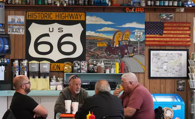 Customers at Cozy Dog Drive In have lunch in Springfield, Ill., Thursday, Nov. 20, 2025. (AP Photo/Jeff Roberson)