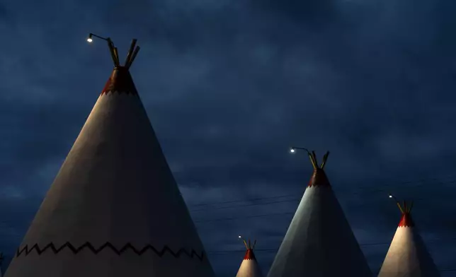 Teepee-shaped rooms at the Wigwam Motel, a landmark along historic Route 66, are seen in Holbrook, Ariz., Wednesday, Nov. 19, 2025. (AP Photo/Jae C. Hong)