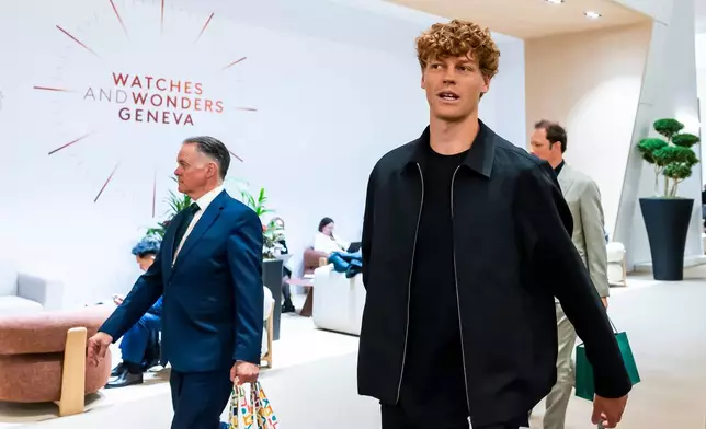 Italian tennis player Jannik Sinner at the opening day of the "Watches and Wonders Geneva" luxury watch fair, in Geneva, Switzerland, Tuesday, April 14, 2026. (Salvatore Di Nolfi/Keystone via AP)