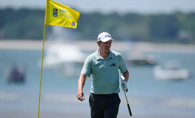 Matt Fitzpatrick, of England, prepares to putt on the 18th hole during the second round at the RBC Heritage golf tournament Friday, April 17, 2026, in Hilton Head, S.C. (AP Photo/Mike Stewart)