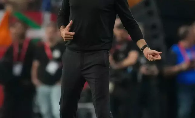 Real Sociedad's head coach Pellegrino Matarazzo gestures during the Copa del Rey final soccer match between Atletico Madrid and Real Sociedad in Seville, Spain, Saturday, April. 18, 2026. (AP Photo/Jose Breton)