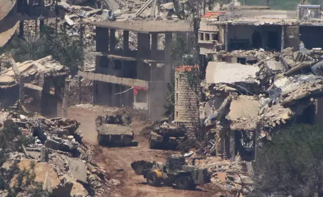 Israeli soldiers operate in southern Lebanon, as seen from northern Israel, Wednesday, April 29, 2026. (AP Photo/Ariel Schalit)