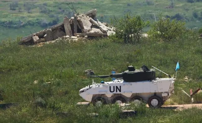 U.N. peacekeepers operate in southern Lebanon, as seen from northern Israel, Wednesday, April 29, 2026. (AP Photo/Ariel Schalit)