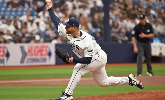 Tampa Bay Rays pitcher Drew Rasmussen throws during the first inning of a baseball game against the New York Yankees, Sunday, April 12, 2026, in St. Petersburg, Fla. (AP Photo/Jason Behnken)