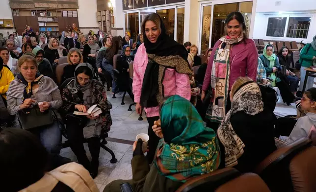 Iranian Jews attend a memorial for the slain Iranian Supreme Leader Ayatollah Ali Khamenei and other victims, who were killed in the U.S. and Israel strikes, at Yousefabad Synagogue, in Tehran, Iran, Thursday, April 16, 2026. (AP Photo/Vahid Salemi)