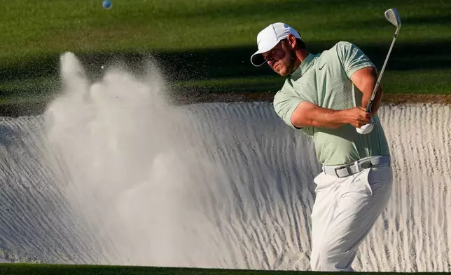 Brooks Koepka hits from the bunker on the 15th hole during the first round of the Masters golf tournament at the Augusta National Golf Club, Thursday, April 9, 2026, in Augusta, Ga. (AP Photo/Matt Slocum)
