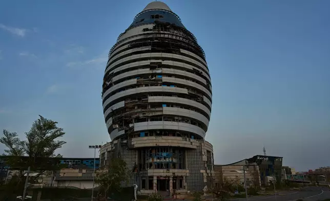 View of the war-damaged Corinthia Hotel in Khartoum, Sudan, Tuesday, April 21, 2026. (AP Photo/Bernat Armangue)