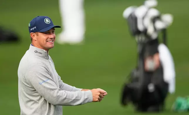 Bryson DeChambeau warms up on the driving range before a practice round ahead of the Masters golf tournament at the Augusta National Golf Club, Tuesday, April 7, 2026, in Augusta, Ga. (AP Photo/Ashley Landis)