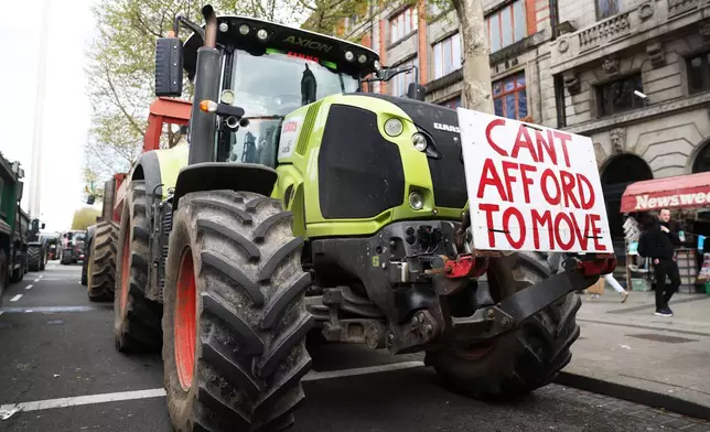 Tractors block O'Connell Street on the fifth day of the National Fuel Protest, in Dublin, Ireland, Saturday, April 11, 2026. (AP Photo/Peter Morrison)