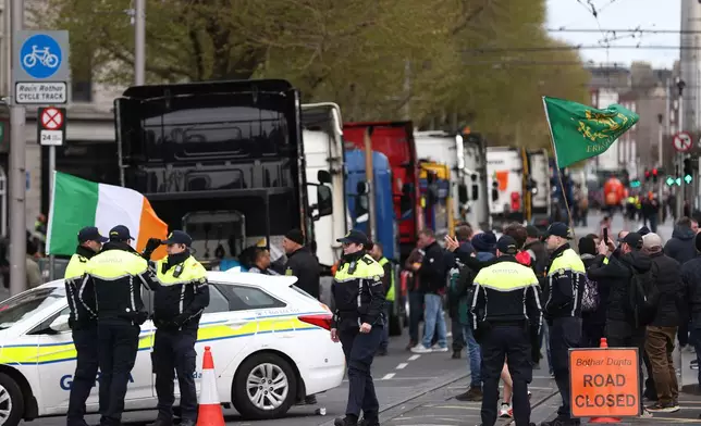 Tractors block O'Connell Street on the fifth day of the National Fuel Protest, in Dublin, Ireland, Saturday, April 11, 2026. (AP Photo/Peter Morrison)