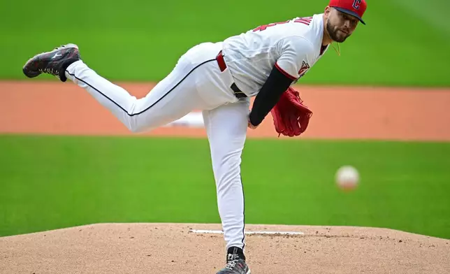 Cleveland Guardians starting pitcher Slade Cecconi delivers against the Chicago Cubs during the first inning of a baseball game, Sunday, April 5, 2026, in Cleveland. (AP Photo/David Dermer)