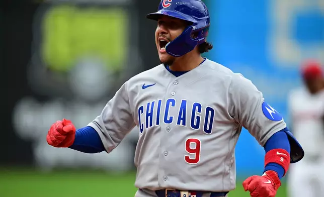 Chicago Cubs' Miguel Amaya celebrates after hitting an RBI single during the eighth inning of a baseball game against the Cleveland Guardians, Sunday, April 5, 2026, in Cleveland. (AP Photo/David Dermer)