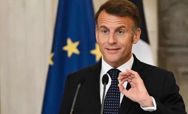 France's President Emmanuel Macron speaks during a media conference with Greece's Prime Minister Kyriakos Mitsotakis at Maximos Mansion in Athens, Greece, Saturday, April 25, 2026. (AP Photo/Michael Varaklas)