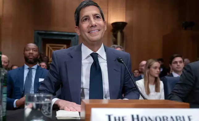 Kevin Warsh testifies during his nomination hearing to be a member and chairman of the Federal Reserve Board of Governors before the Senate Banking, Housing and Urban Affairs Committee on Capitol Hill, in Washington Tuesday, April 21, 2026. (AP Photo/Jose Luis Magana)