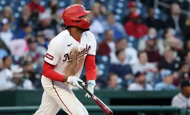Washington Nationals' James Wood runs after hitting a solo home run against Atlanta Braves pitcher Reynaldo López during the second inning of a baseball game, Tuesday, April 21, 2026, in Washington. (AP Photo/Terrance Williams)