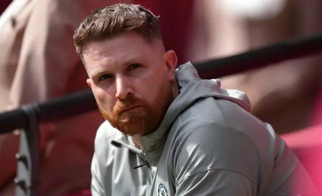 Chelsea's interim manager Calum McFarlane sits on the bench during the FA Cup semifinal soccer match between Chelsea and Leeds in London, England, Sunday, April 26, 2026. (AP Photo/Alastair Grant)