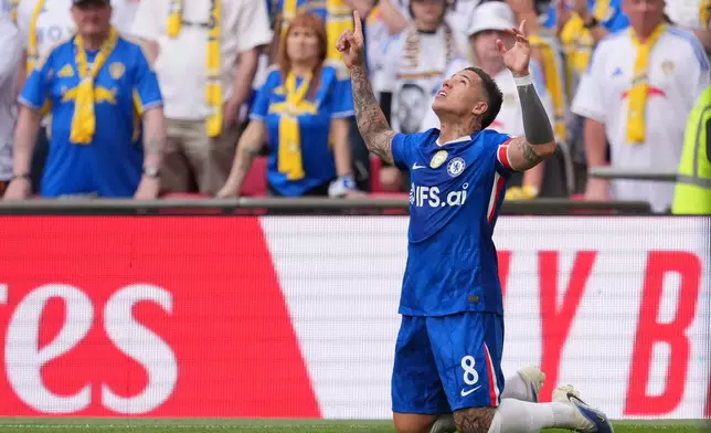Chelsea's Enzo Fernandez celebrates after scoring during the FA Cup semifinal soccer match between Chelsea and Leeds in London, England, Sunday, April 26, 2026. (AP Photo/Kin Cheung)