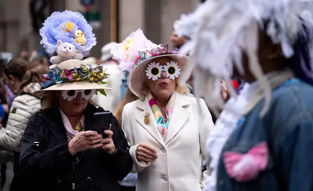 People participate in the Easter Bonnet Parade on Fifth Avenue, Sunday, April 5, 2026, in New York. (AP Photo/Adam Gray)