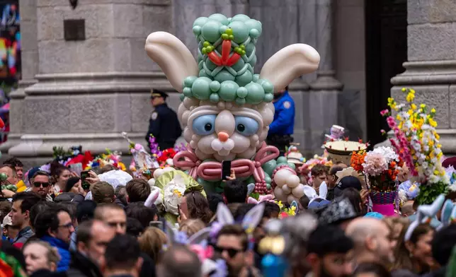 People participate in the Easter Bonnet Parade on Fifth Avenue, Sunday, April 5, 2026, in New York. (AP Photo/Adam Gray)