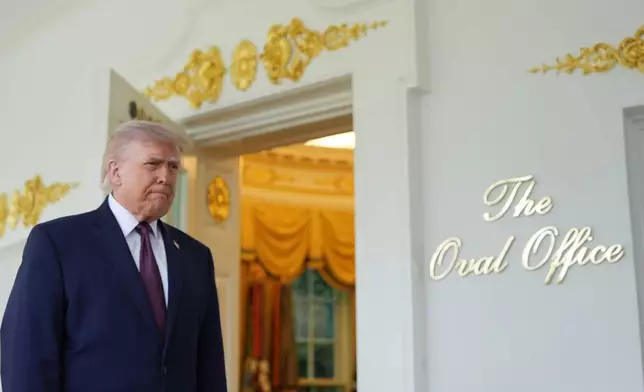 President Donald Trump speaks outside the Oval Office of the White House, Monday, April 13, 2026, in Washington. (AP Photo/Alex Brandon)
