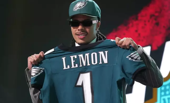 Southern California wide receiver Makai Lemon poses after being chosen by the Philadelphia Eagles with the 20th overall pick during the first round of the NFL football draft, Thursday, April 23, 2026, in Pittsburgh. (AP Photo/Gene J. Puskar)