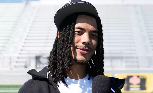Makai Lemon, USA wide receiver, is interviewed after the NFL's annual prospect clinic ahead of the NFL football draft Wednesday,April 22, 2026, in Pittsburgh. (AP Photo/Sue Ogrocki)